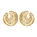 Geometric women's earrings with gold pleating and a concave-convex textured surface.