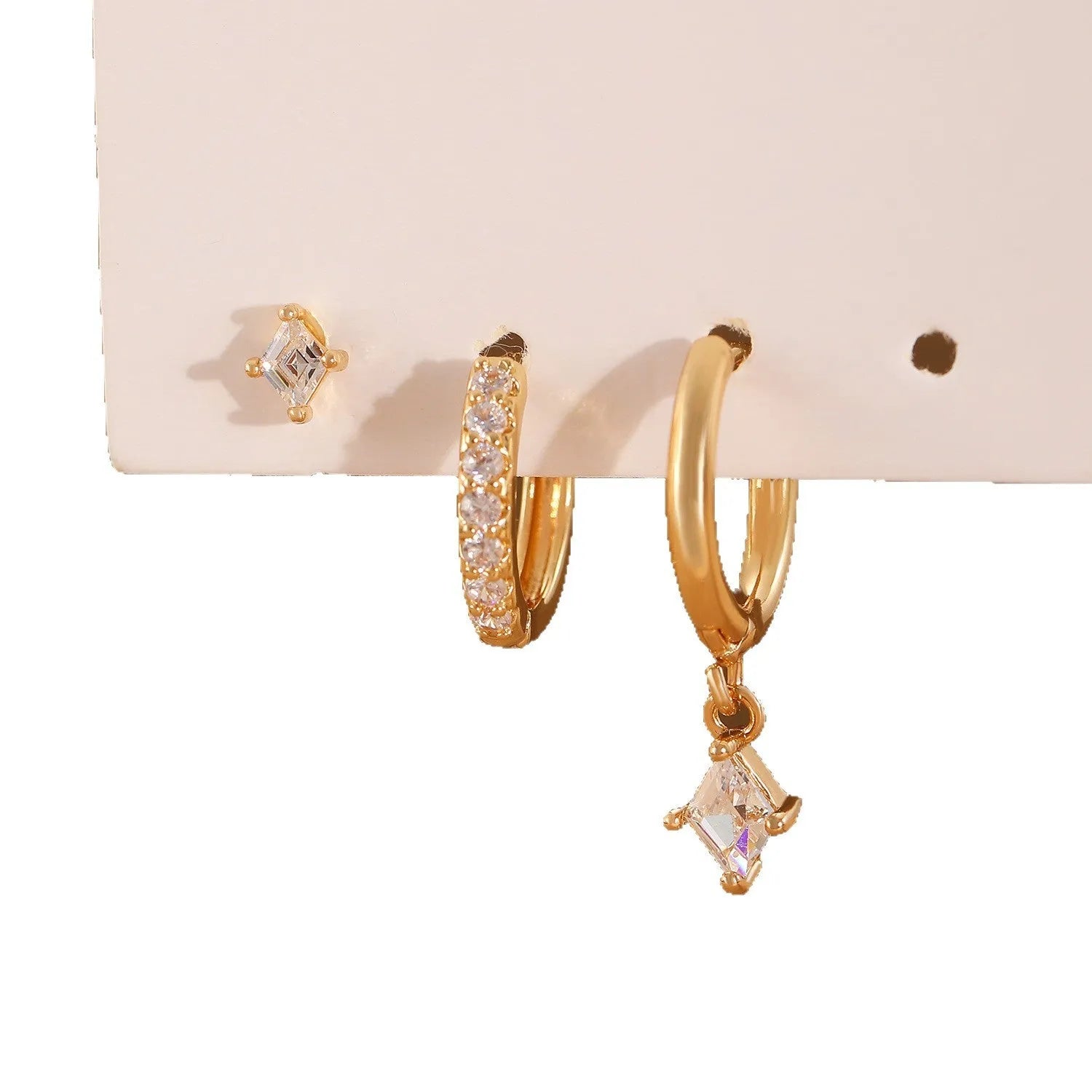 Geometric ladies earring set with zircon detailing in gold and white colours