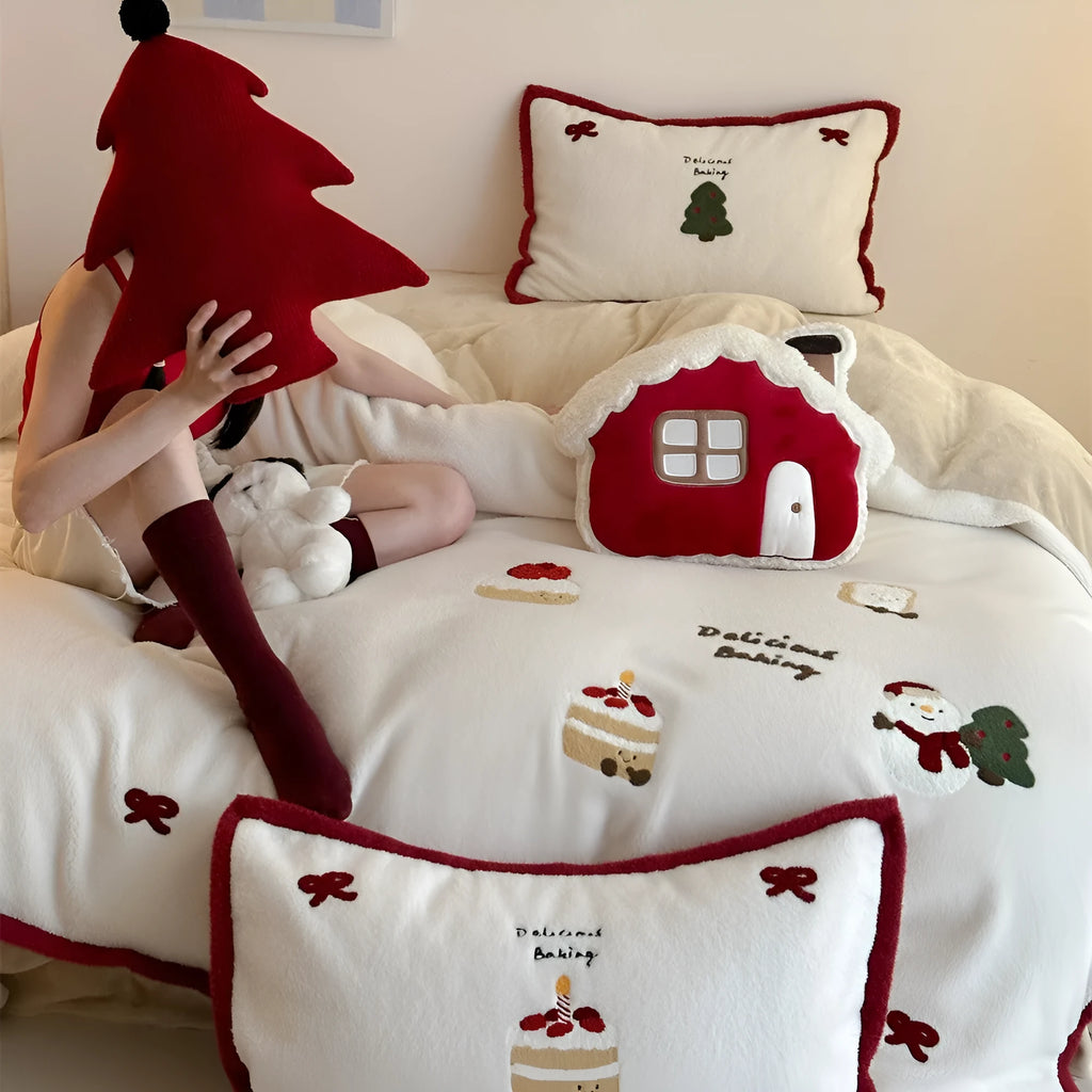 Winter Christmas themed bedding four-piece set with heart cartoon designs on thickened cashmere polyester fabric