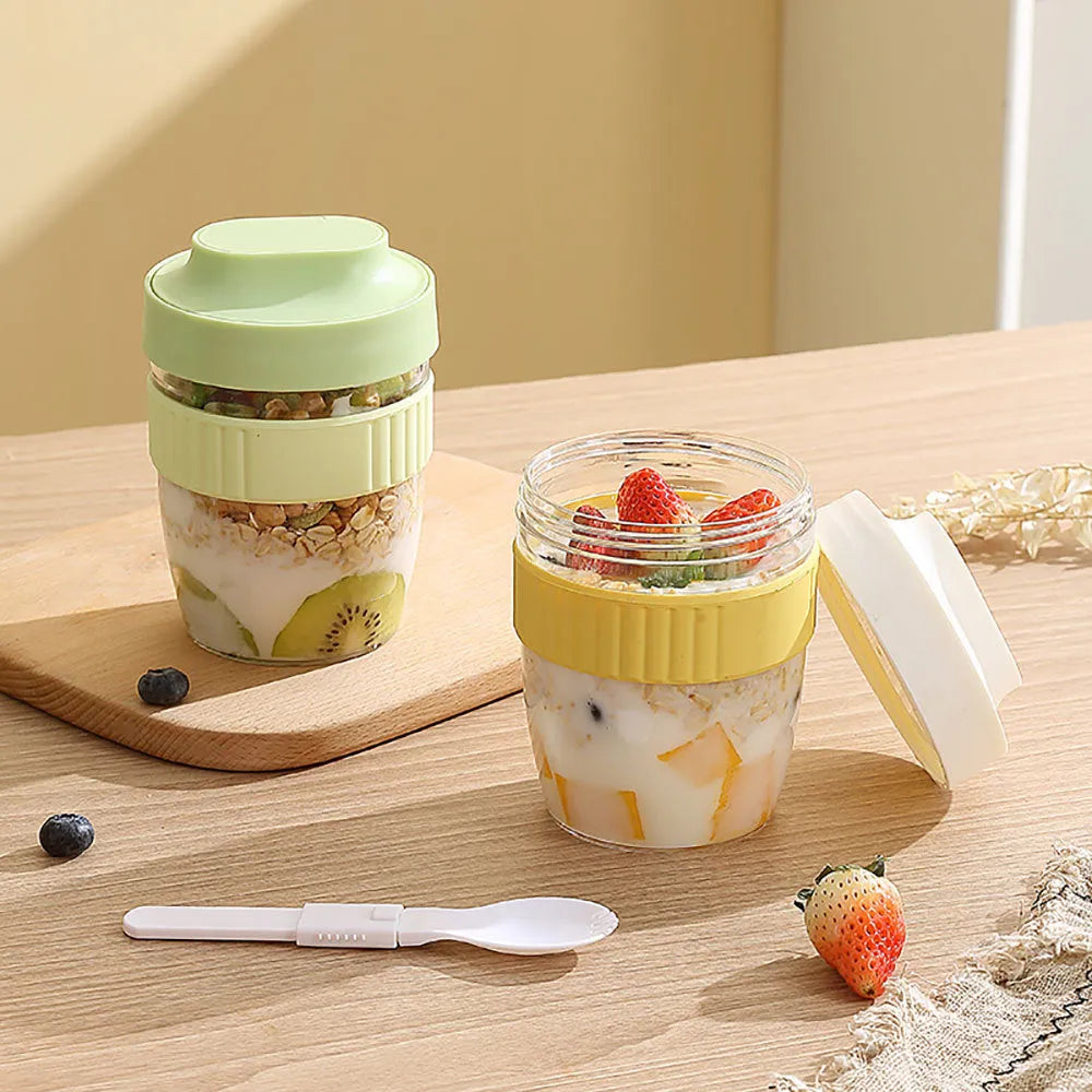 Modern simplicity plastic salad cup with lid and spoon in green, shown next to purple and pink options.