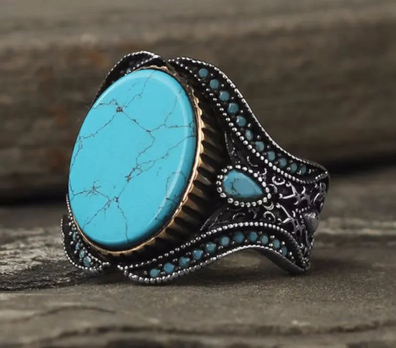 Men's antique silver alloy ring with turquoise decorative detail on a circular band