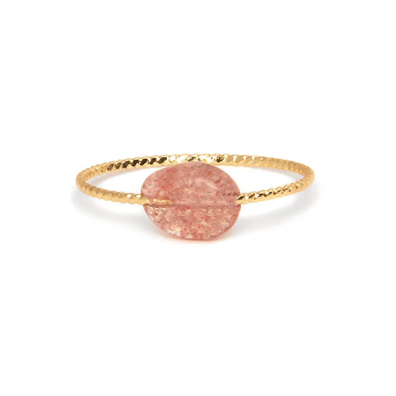 A women's ring featuring a geometric design set with a coloured agate stone.