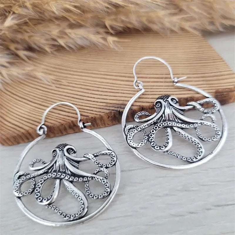 Vintage octopus earrings in antique silver finish with zinc alloy construction and animal zodiac design