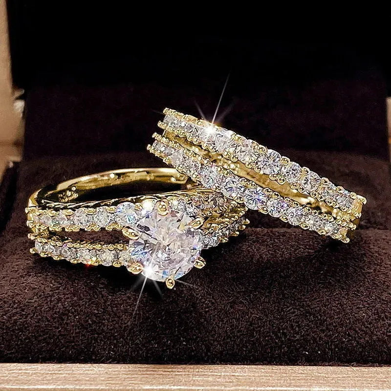 2-in-1 fully-jewelled female ring set in geometric design with round elements, shown in silver, gold and rose gold finishes