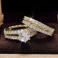 2-in-1 fully-jewelled female ring set in geometric design with round elements, shown in silver, gold and rose gold finishes