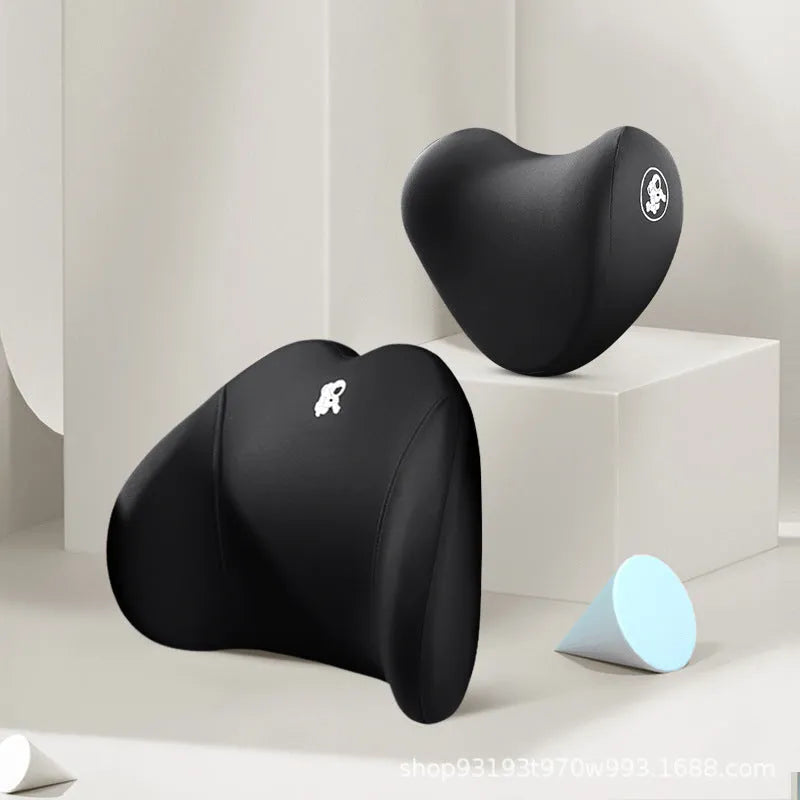 Heart-shaped car pillow in choice of colours, shown as headrest and lumbar support on a car seat.