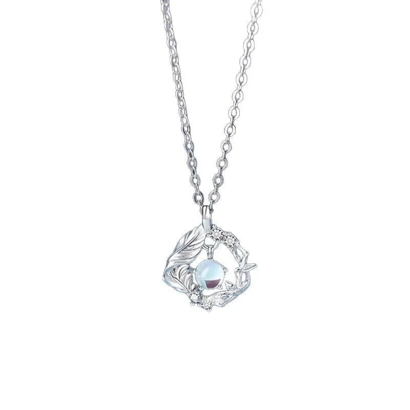 Women's geometric alloy pendant necklace with tree and bird design on adjustable chain