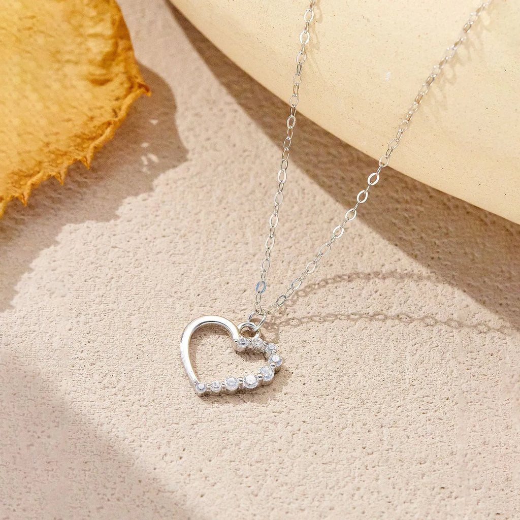 S925 sterling silver hollow heart necklace with choice of gold or platinum plating