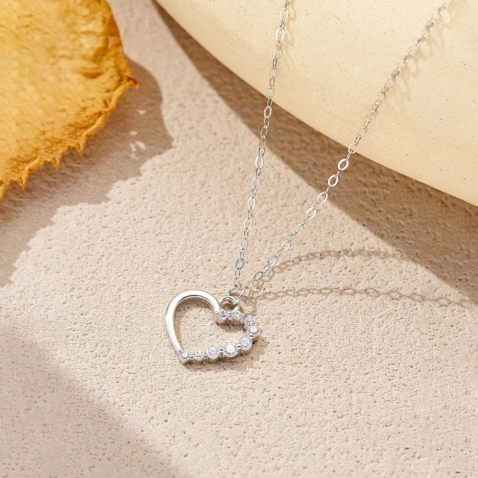 S925 sterling silver hollow heart necklace with choice of gold or platinum plating
