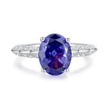 Sterling silver heart-shaped ring with ice flower cut tan sang zircon stone setting.