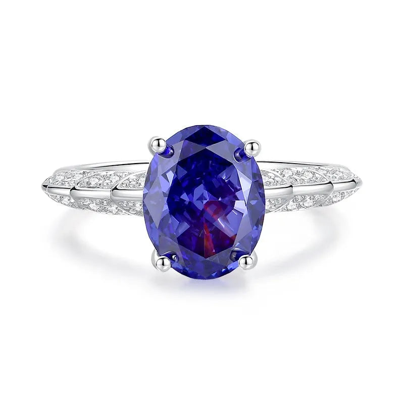 Sterling silver heart-shaped ring with ice flower cut tan sang zircon stone setting.
