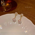 Camellia pearl flower stud earrings for women with alloy flower shape and silver-tone pearl detailing
