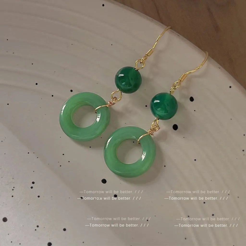 Green jade design earrings with peace buckle shape in Chinese style geometric form