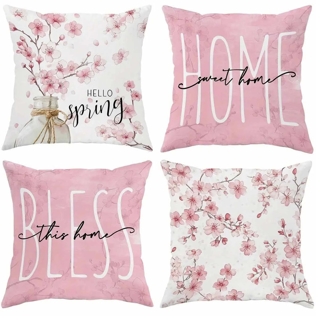 Short velvet cushion cover with cherry blossom letter design, 45cm square, shown in one of four colour options.