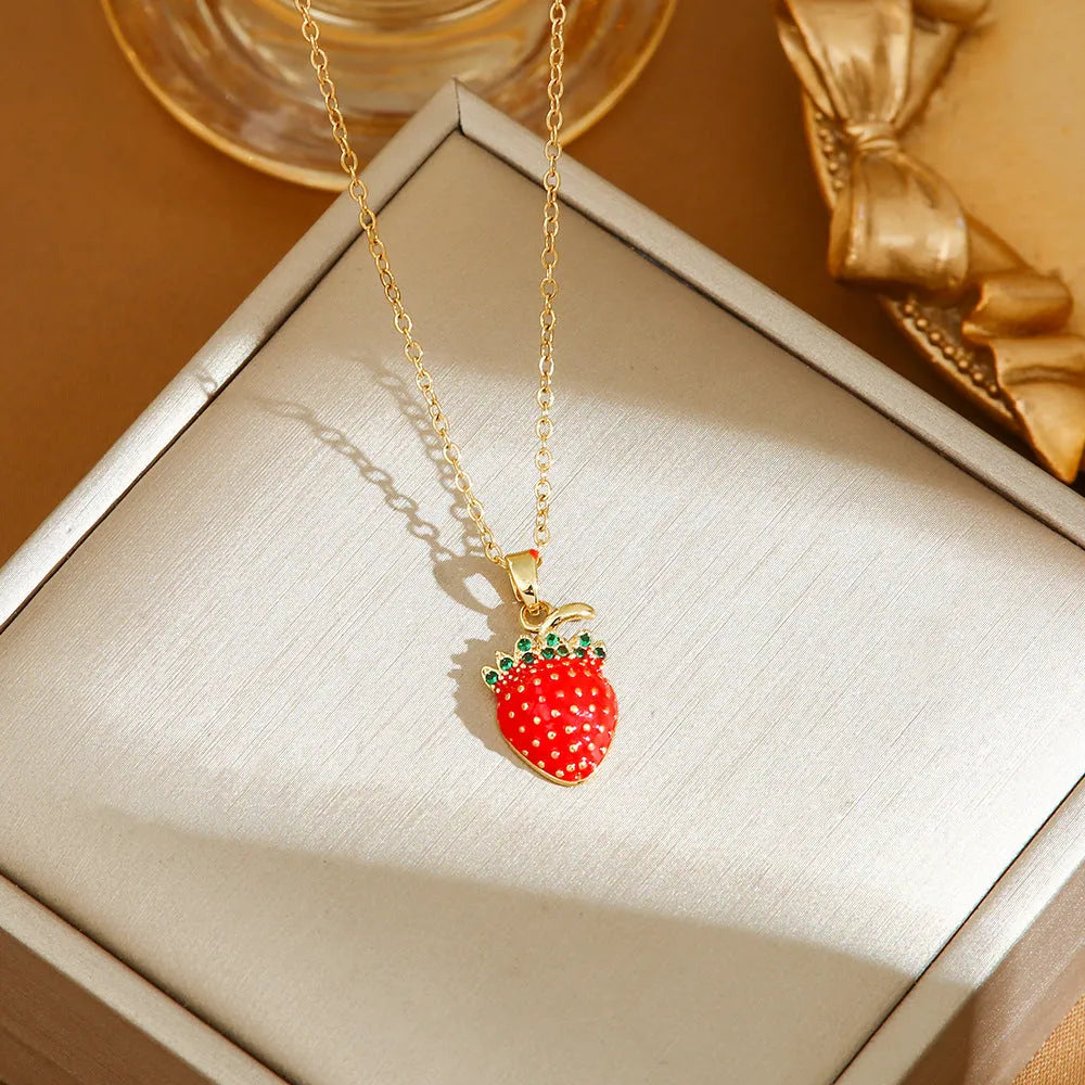 Titanium steel indie necklace with O-ring chain and a choice of cherry, strawberry, or pepper pendant in golden or steel finishes.