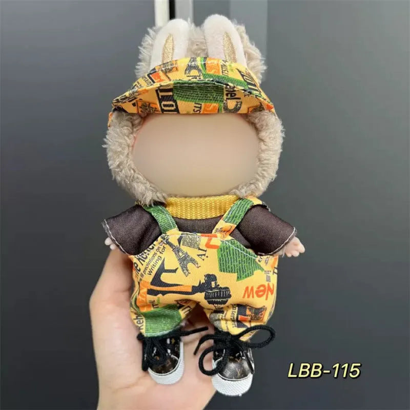 Plastic clothing outfit for a 17cm tall vinyl figure or doll on a display stand.