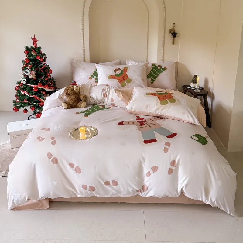 Christmas-themed cartoon printed duvet cover and pillowcase set on a bed, showing Gingerbread Man pattern.
