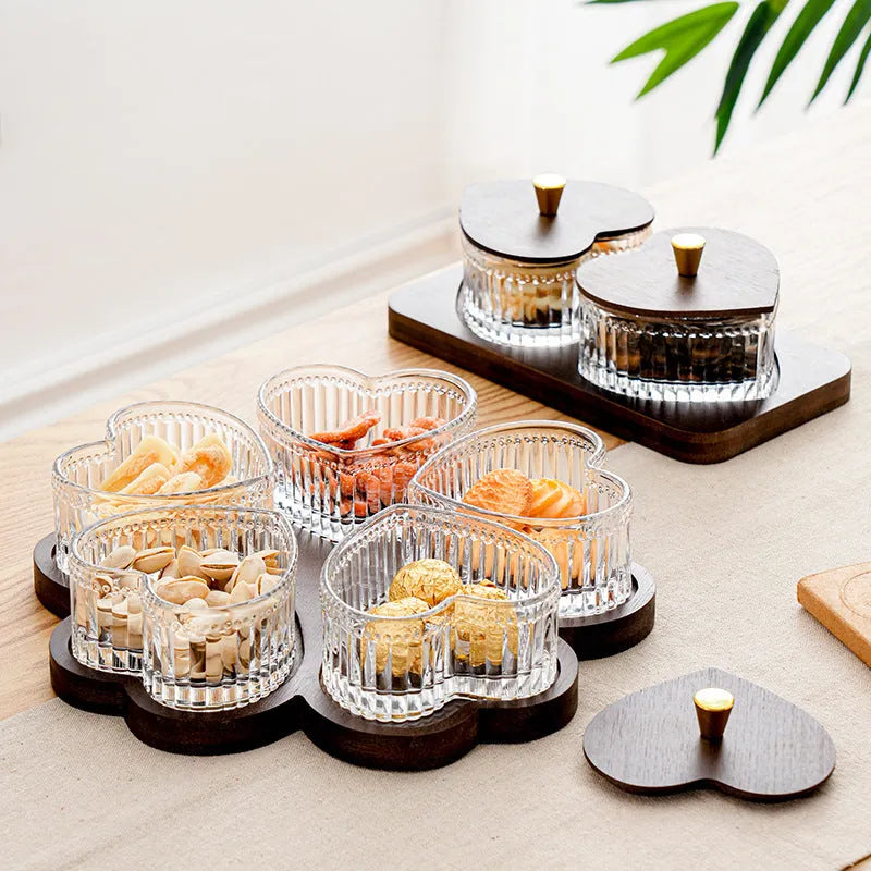 Glass serving platter with heart-shaped lids in a 4-grid configuration on a table