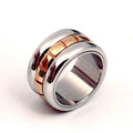 Ultra-wide gold titanium steel knuckle ring with rotating band on hand