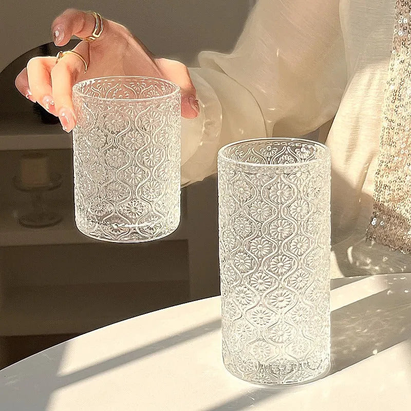 Carved begonia pattern glass water cup in solid colour showing 380ml high model and 250ml short version