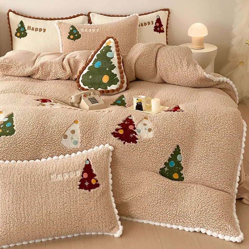 Bright yellow fleece-lined bedding set with embroidered Christmas tree pattern, shown on a double bed.