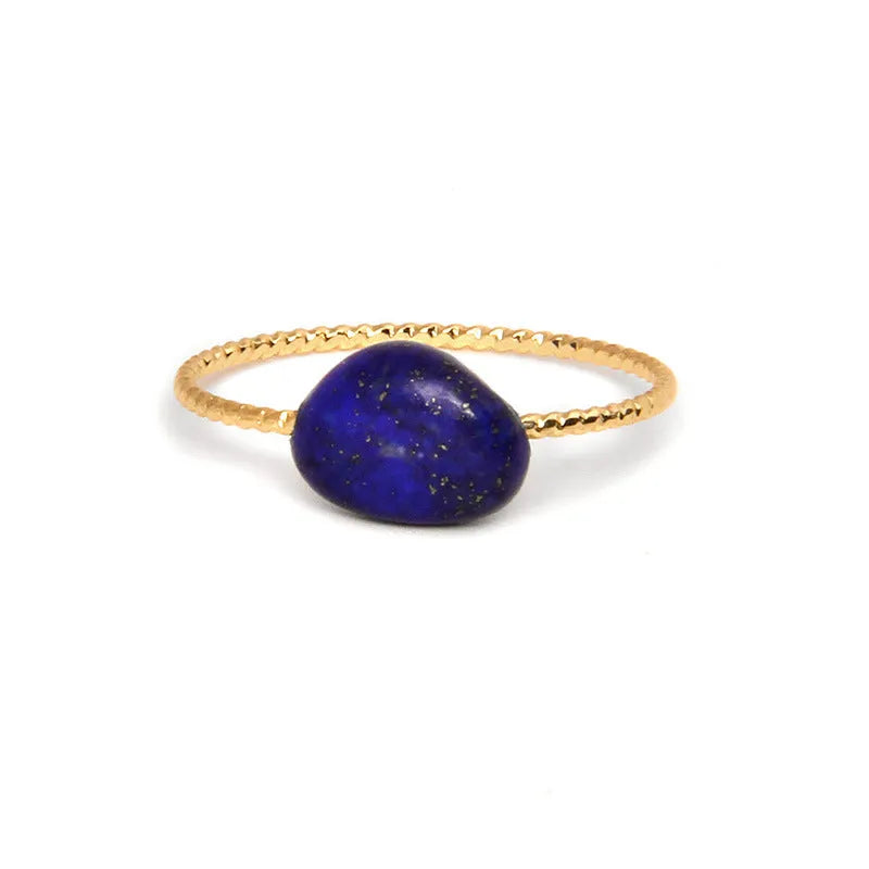 A women's ring featuring a geometric design set with a coloured agate stone.