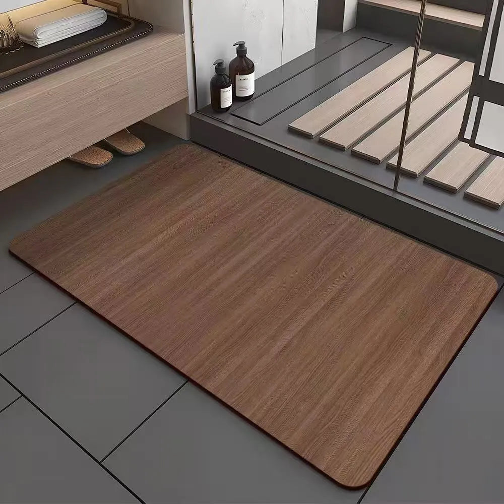 Square diatomaceous earth bathroom floor mat with geometric pattern and wood-grain colour design.