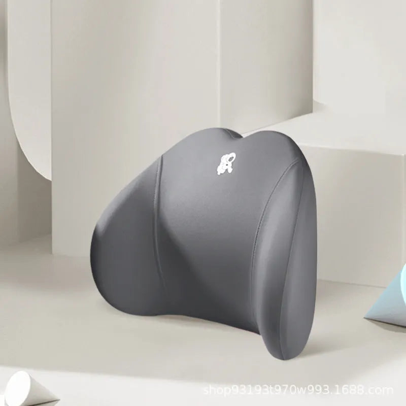 Heart-shaped car pillow in choice of colours, shown as headrest and lumbar support on a car seat.