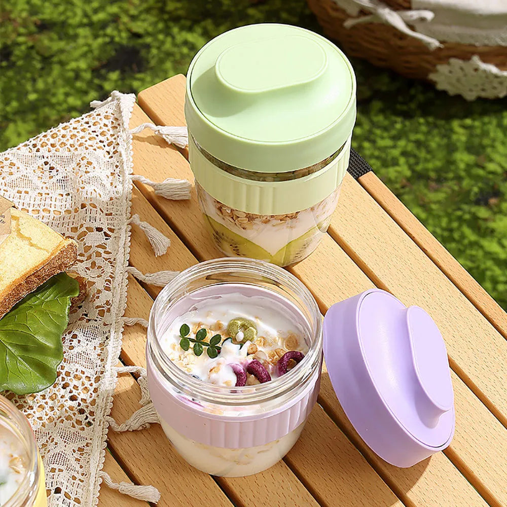Modern simplicity plastic salad cup with lid and spoon in green, shown next to purple and pink options.