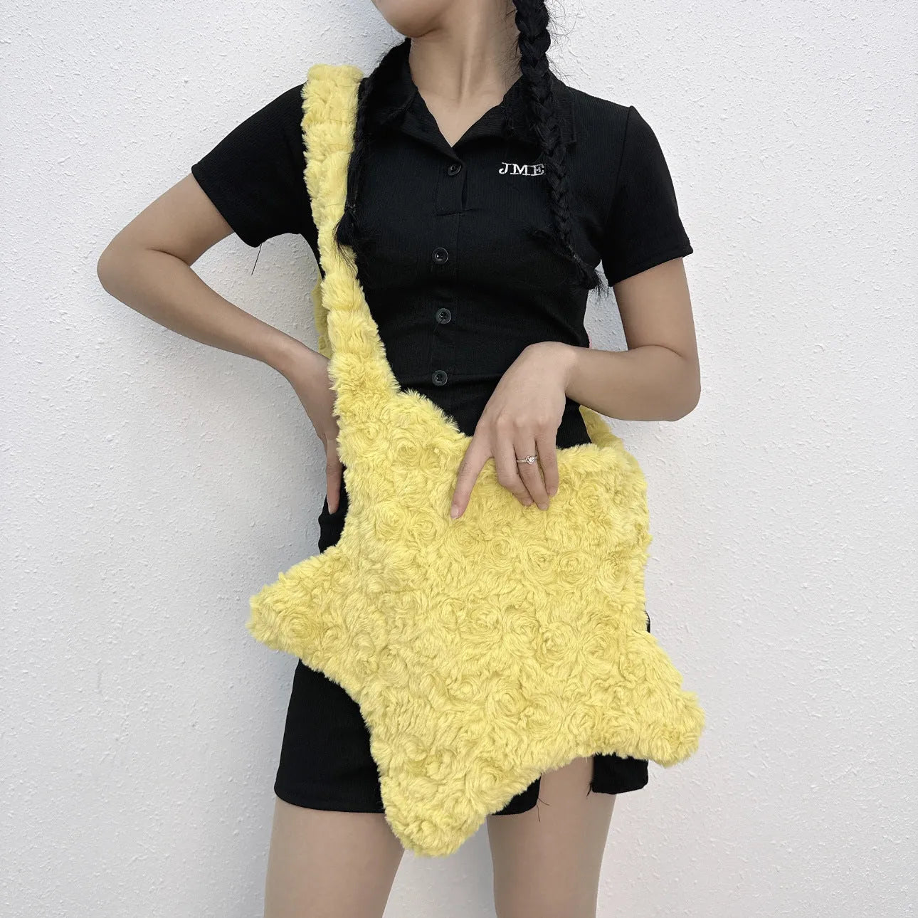 XINGX solid colour plush crossbody bag in black with soft texture and single shoulder strap
