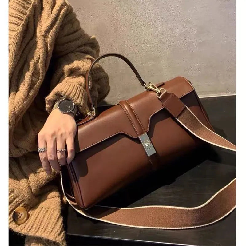 Women's genuine cowhide messenger bag in European retro style with organiser compartments