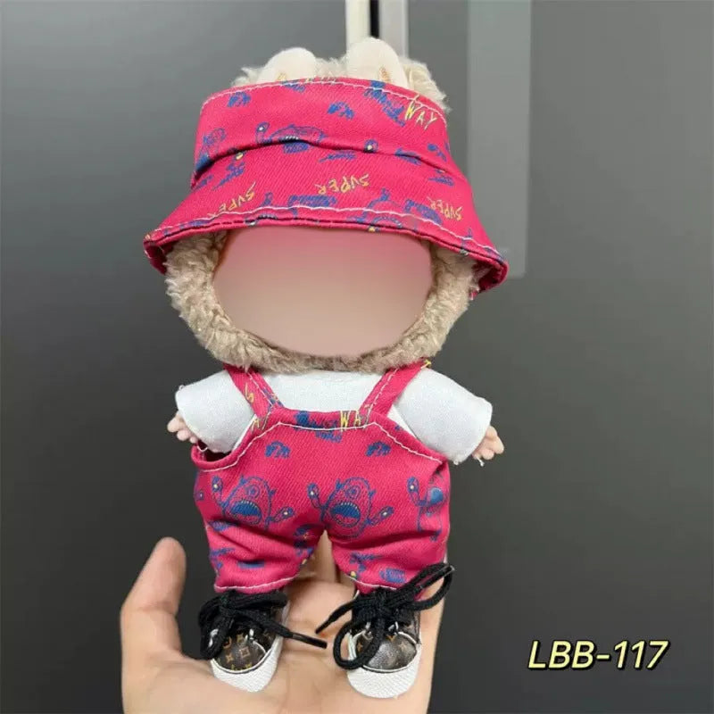 Plastic clothing outfit for a 17cm tall vinyl figure or doll on a display stand.