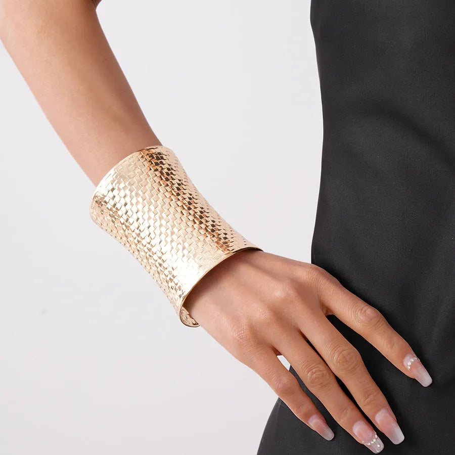 Women's vintage exaggerated gold silver metal bracelet with round design measuring 6.5cm by 9.7cm