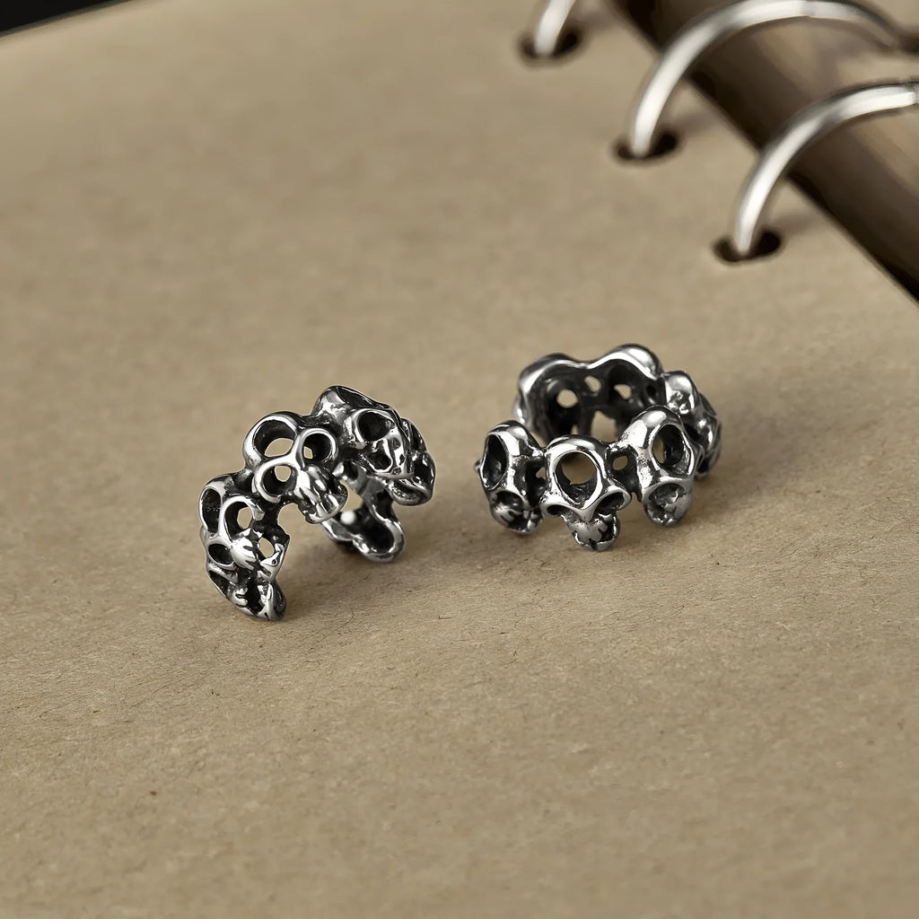 Stainless steel skull ear clip earrings with geometric hollow design and electroplated finish