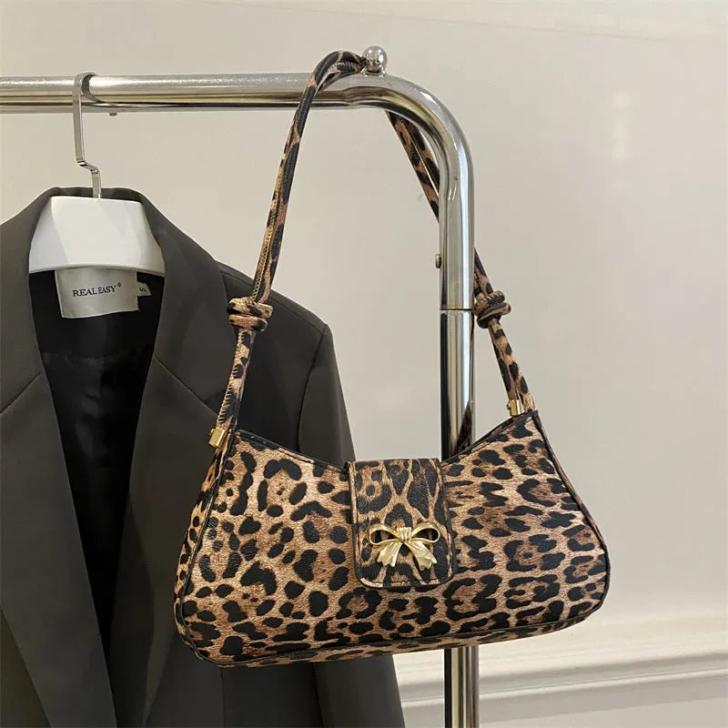 Large capacity casual women's handbag with sandwich pocket in PU leather, showing black colour option