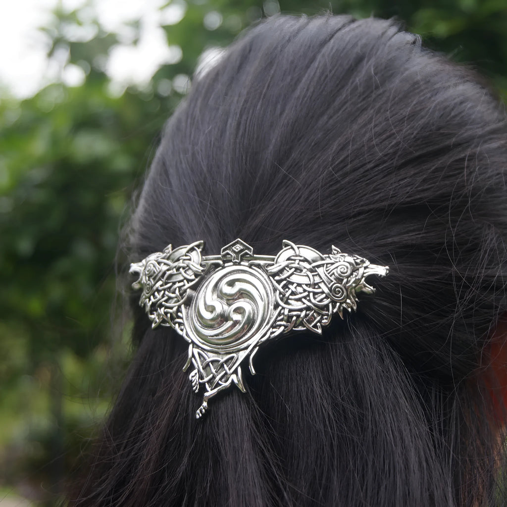 Women's Nordic retro double wolf hair clip in silver alloy on a light background