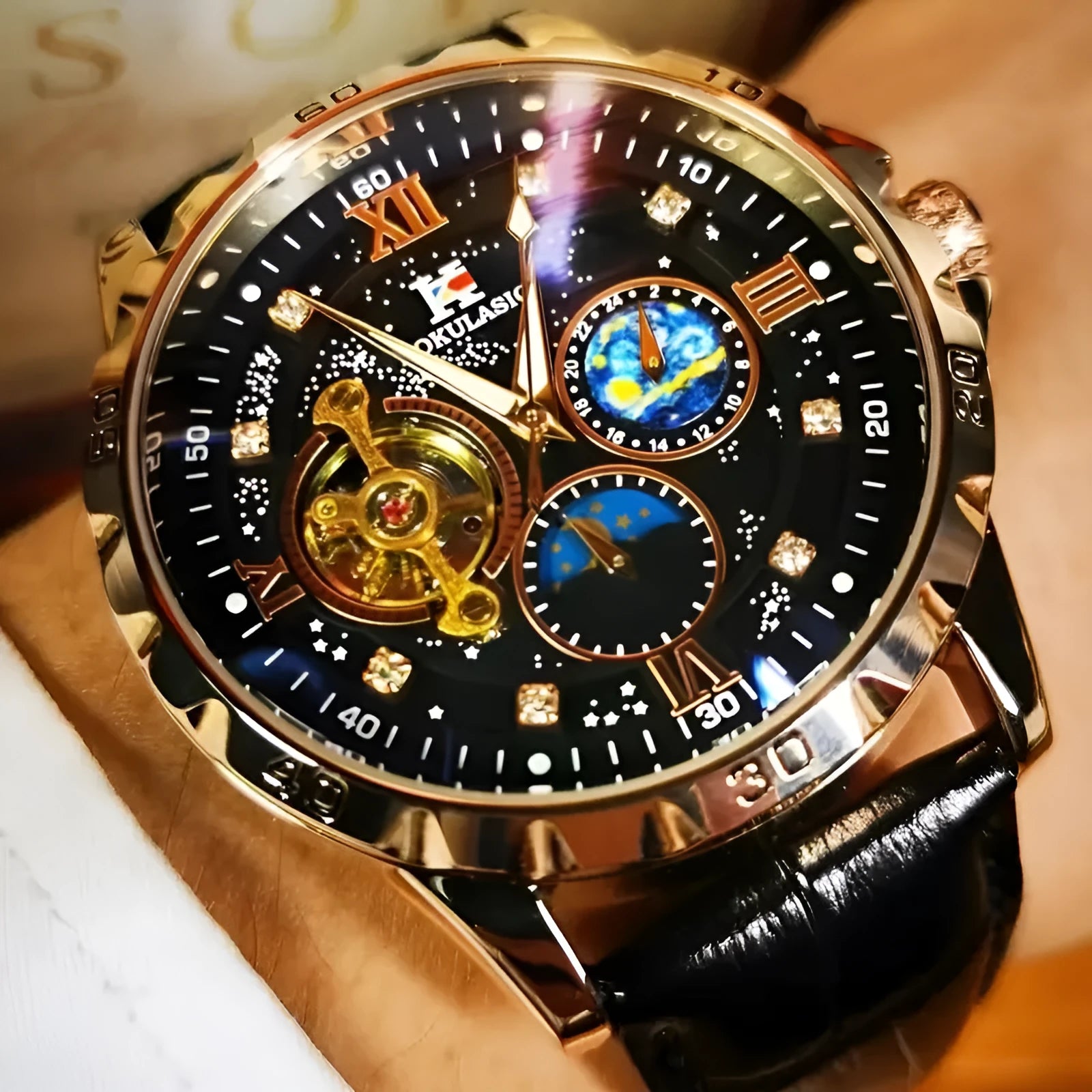 Automatic mechanical watch with large hollow dial and black leather strap on rose gold case