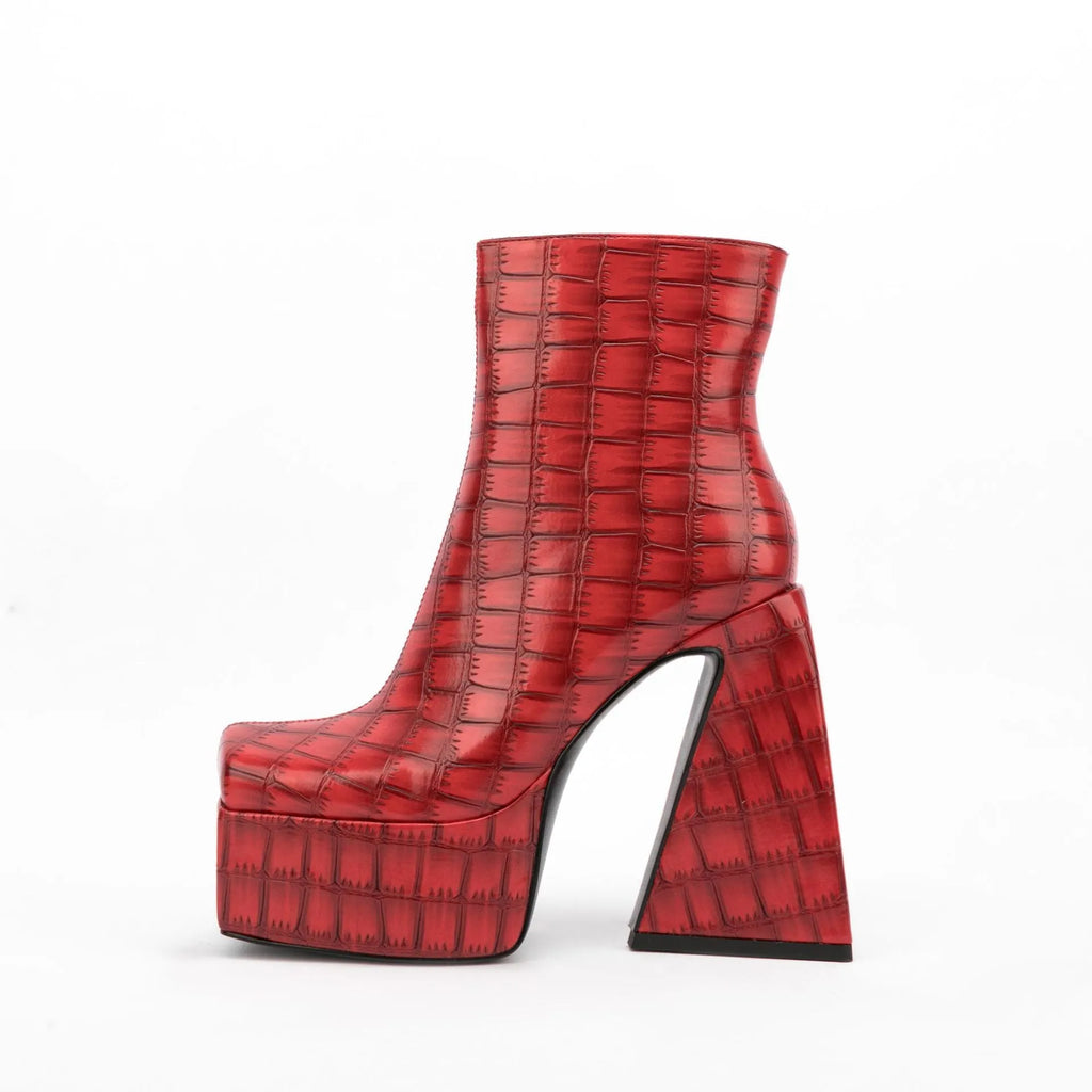 Women's ankle boot with a super high heel in a solid beige colour, made from artificial PU.