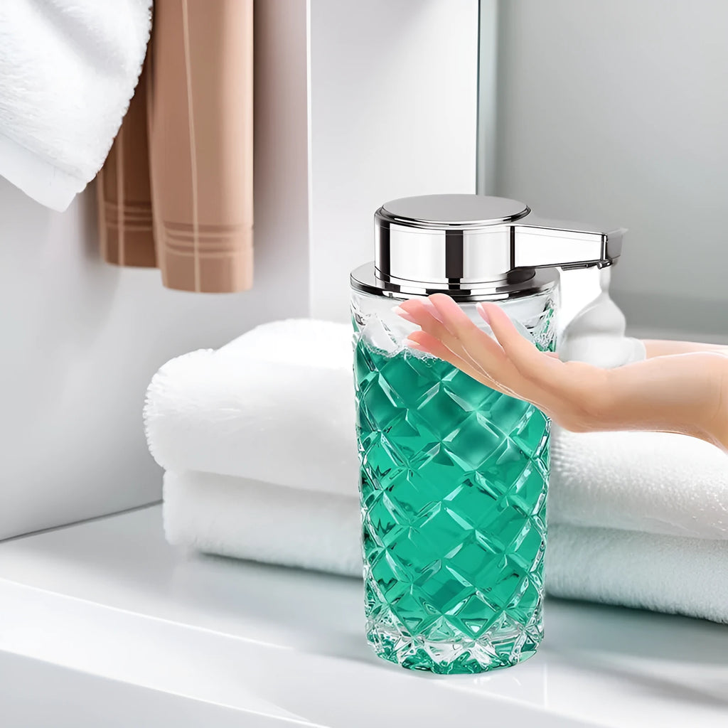 Silver automatic soap dispenser with sensor and Type-C charging port on a bathroom counter.