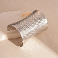 Women's vintage exaggerated gold silver metal bracelet with round design measuring 6.5cm by 9.7cm