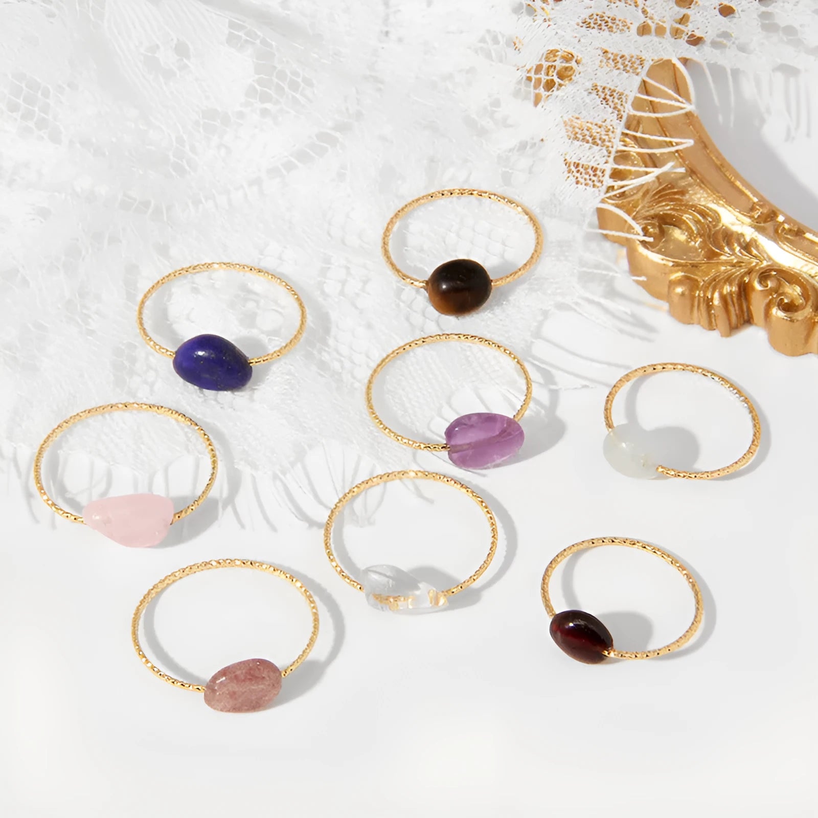 A women's ring featuring a geometric design set with a coloured agate stone.
