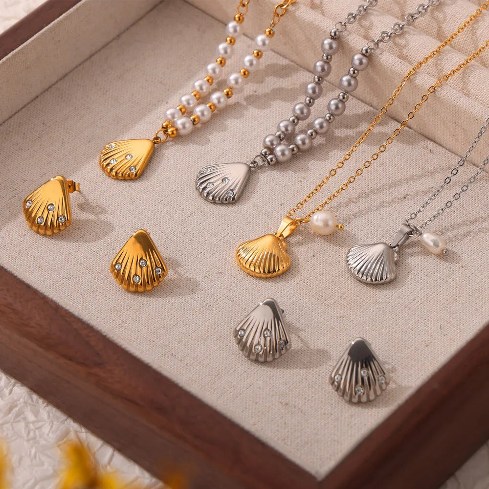 Women's titanium steel necklace with freshwater pearl beads and French vintage shell pendant.