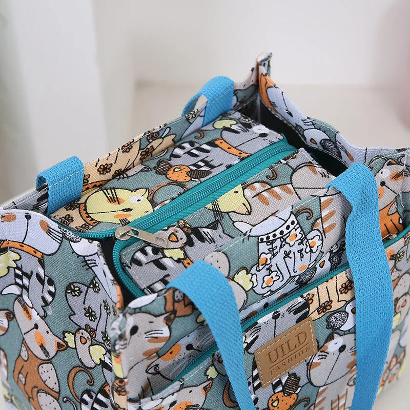Women's large printed canvas tote bag in a choice of floral and cat designs