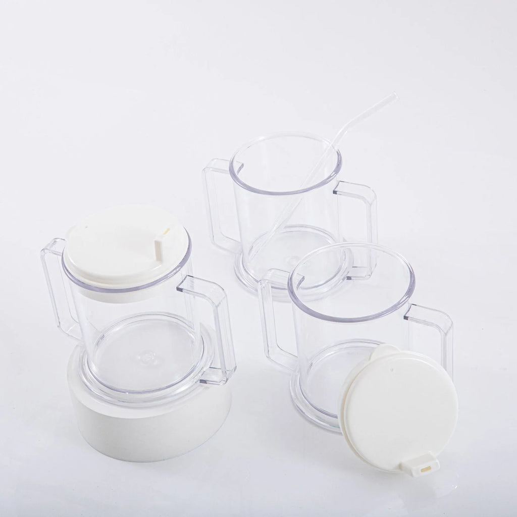 Transparent plastic drinking cup with spill-proof design on a plain background.