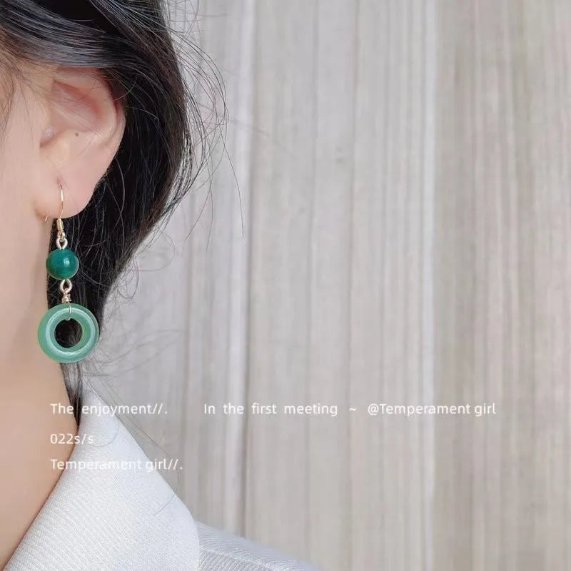 Green jade design earrings with peace buckle shape in Chinese style geometric form