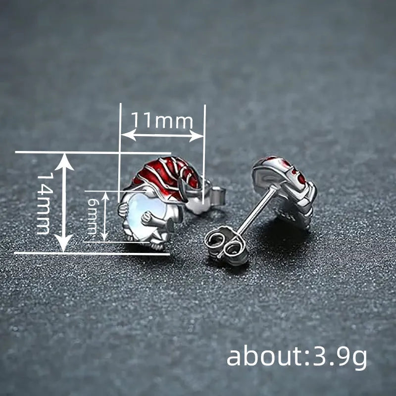 Women's silver-toned heart-shaped earrings with a Santa Claus decoration.