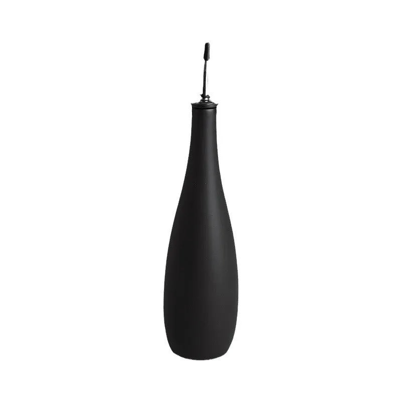 Ceramic kitchen oil pot with funnel and oil brush in black, coffee, or white.