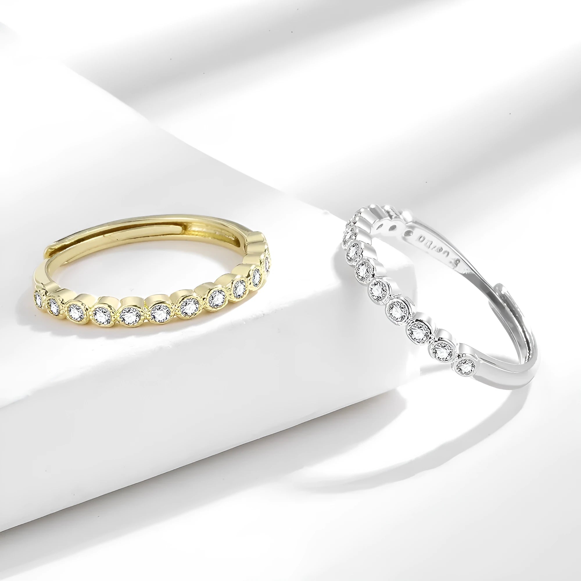 Women's geometric open mouth ring with diamond tail design in electroplated gold finish