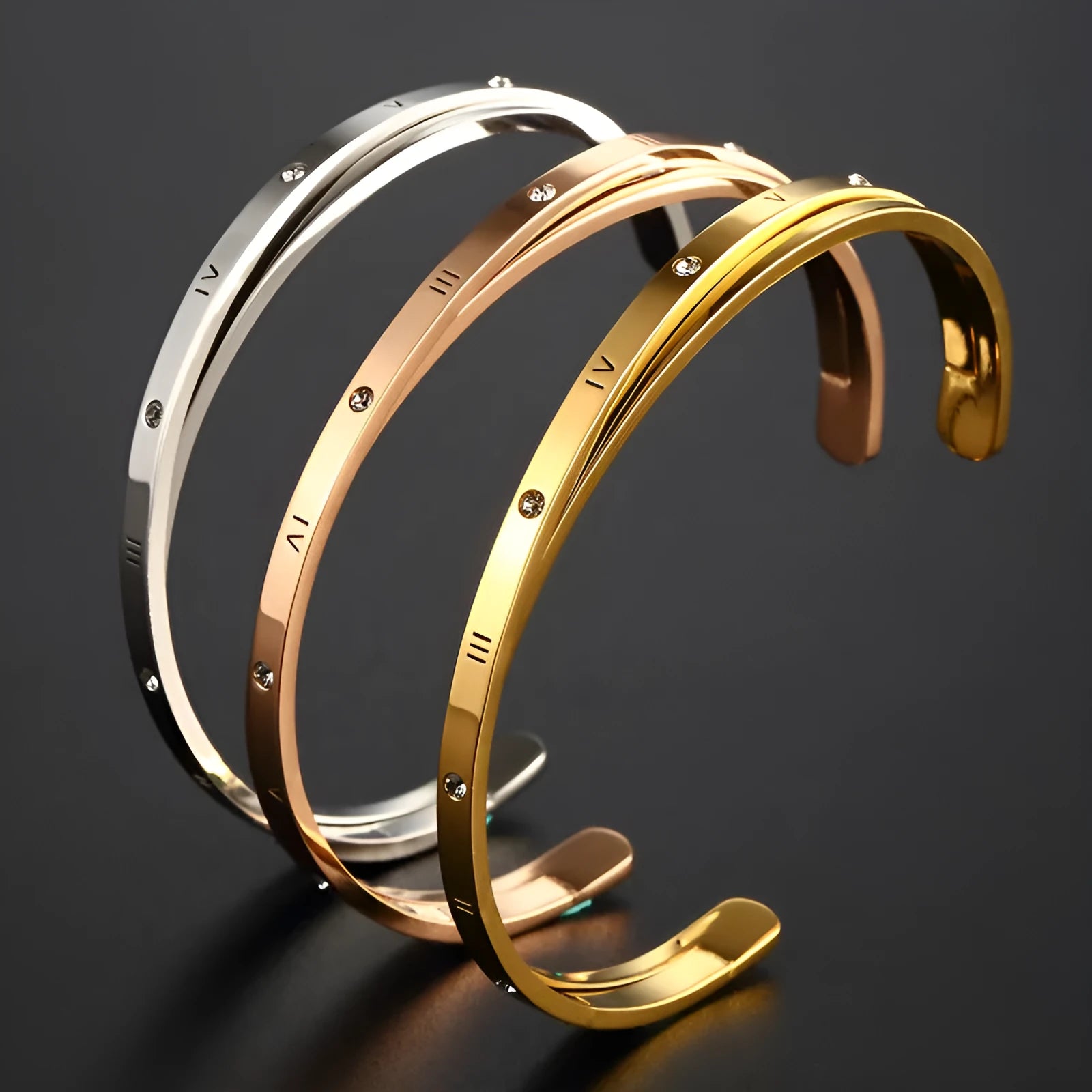 Women's stainless steel open-ended bracelet with inlaid zircon stones in gold colour.