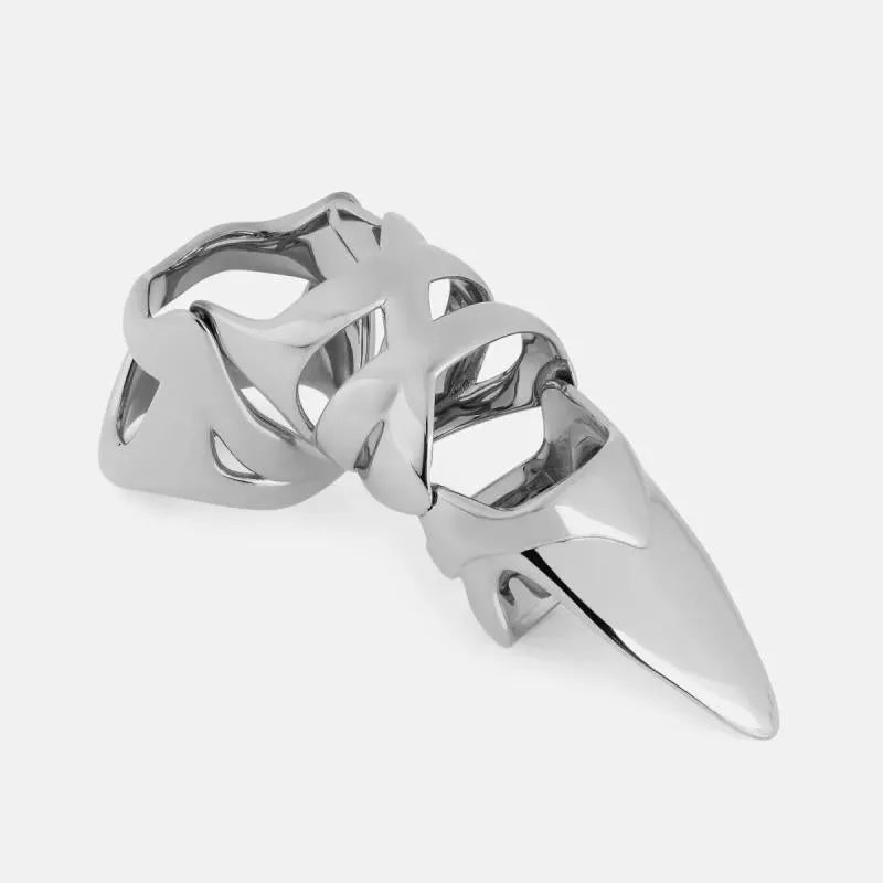 Silver alloy punk armour finger covers laid out on a dark surface.
